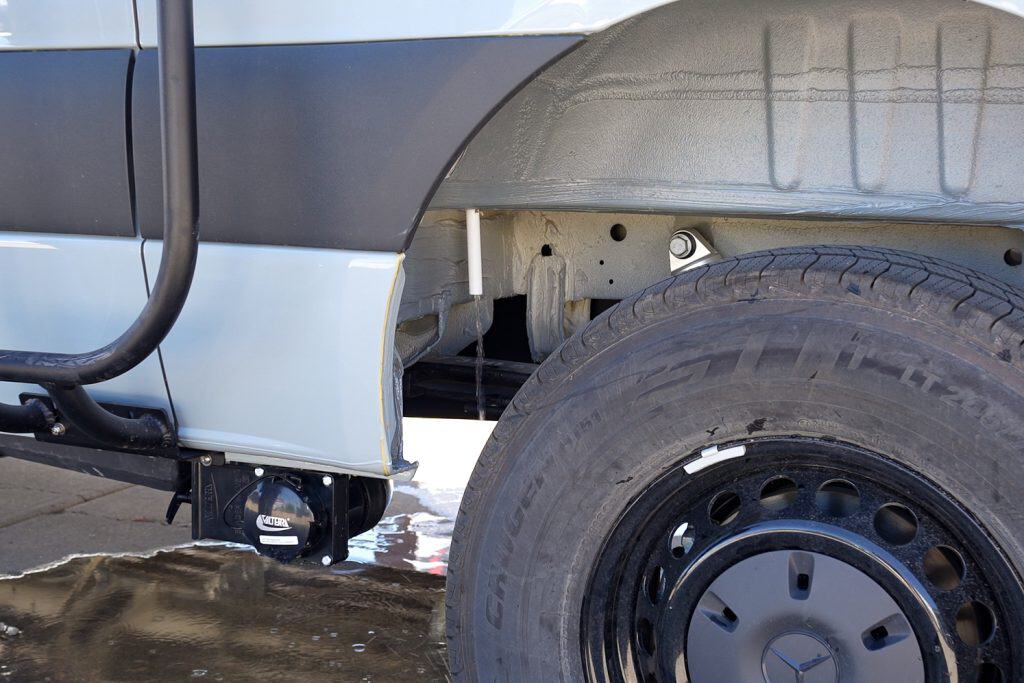 This shows water leaving the outside of the van during winterization.