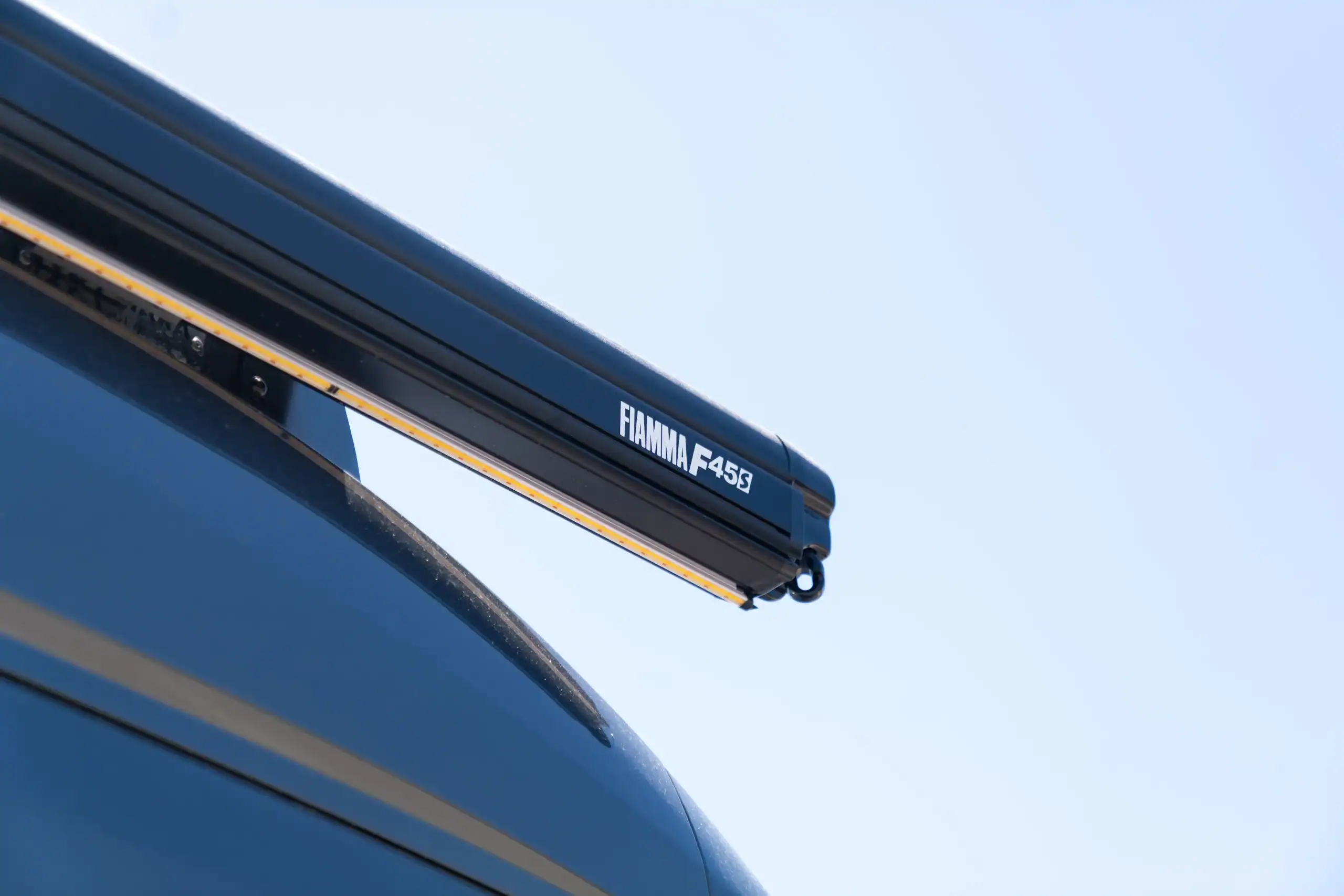 FAMMA F45S roof rack mounted on a van for cargo transport.