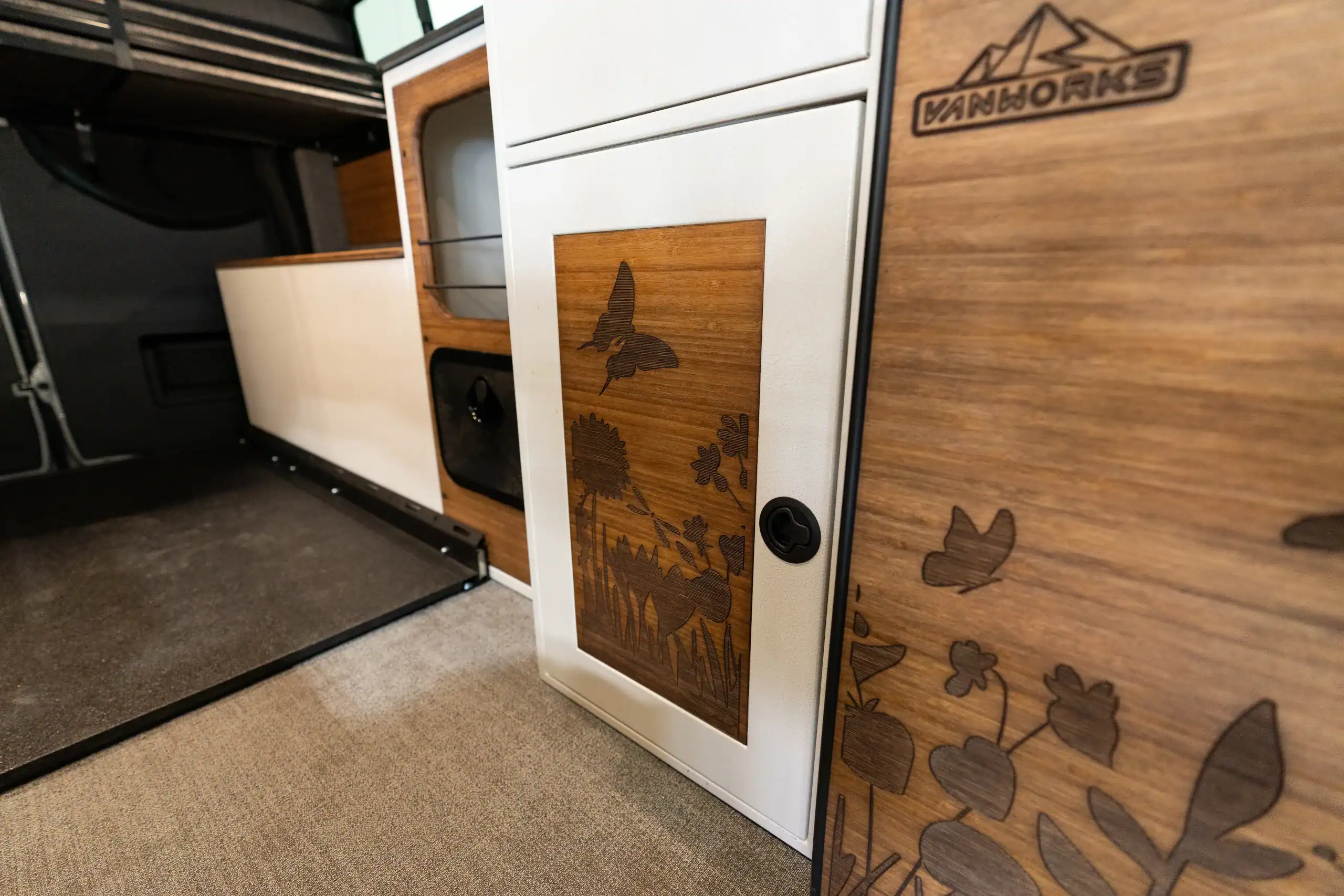 Close-up of custom wood paneling in Vanworks Sprinter conversion.